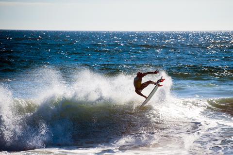 Surfer at Valparaiso, Chile