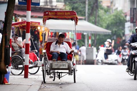 Cyclo driver, Hanoi, Vietnam