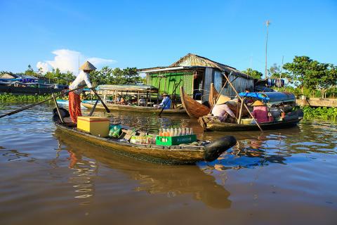 Take a day tour into the colourful Mekong Delta