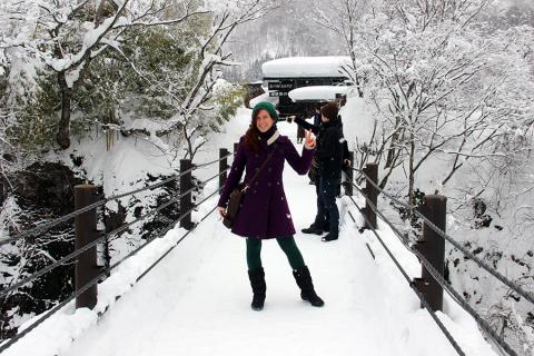 Stefanie waves from snow covered bridge