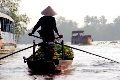 Mekong Delta Frau auf Kanu in Vietnam