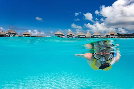Snorkel through crystal clear waters in French Polynesia | Travel Nation