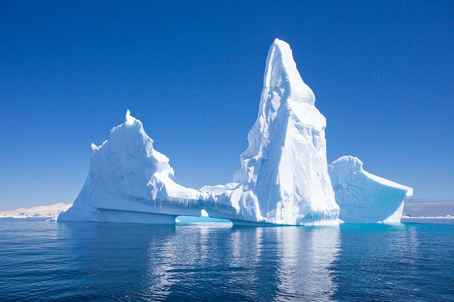 Stunning icebergs tower out of the icy waters