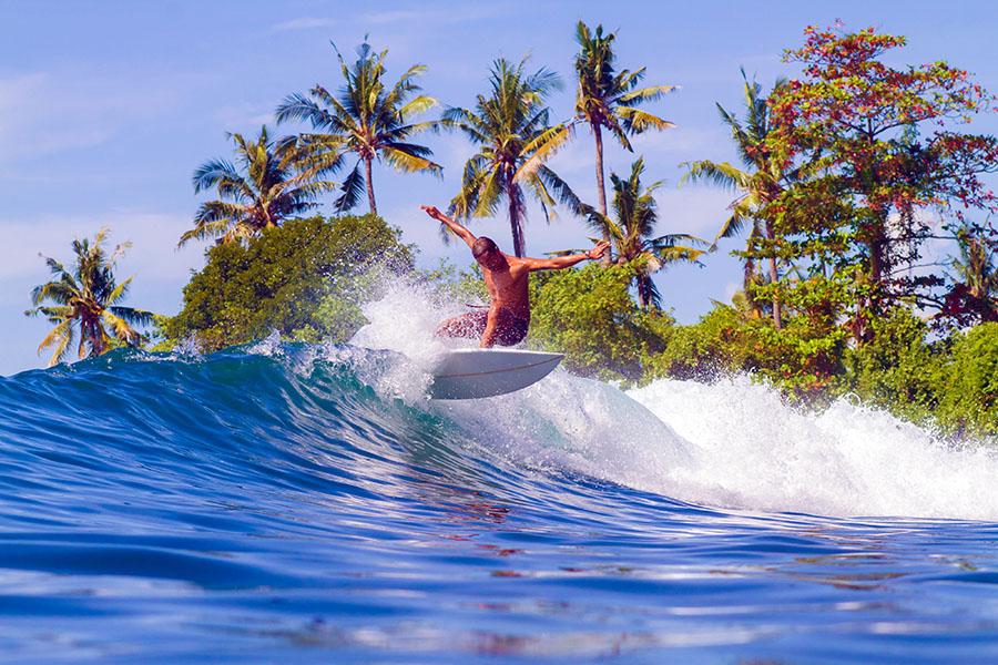 Surf&#039;s up! Catch the waves off the beaches of Lombok and Bali